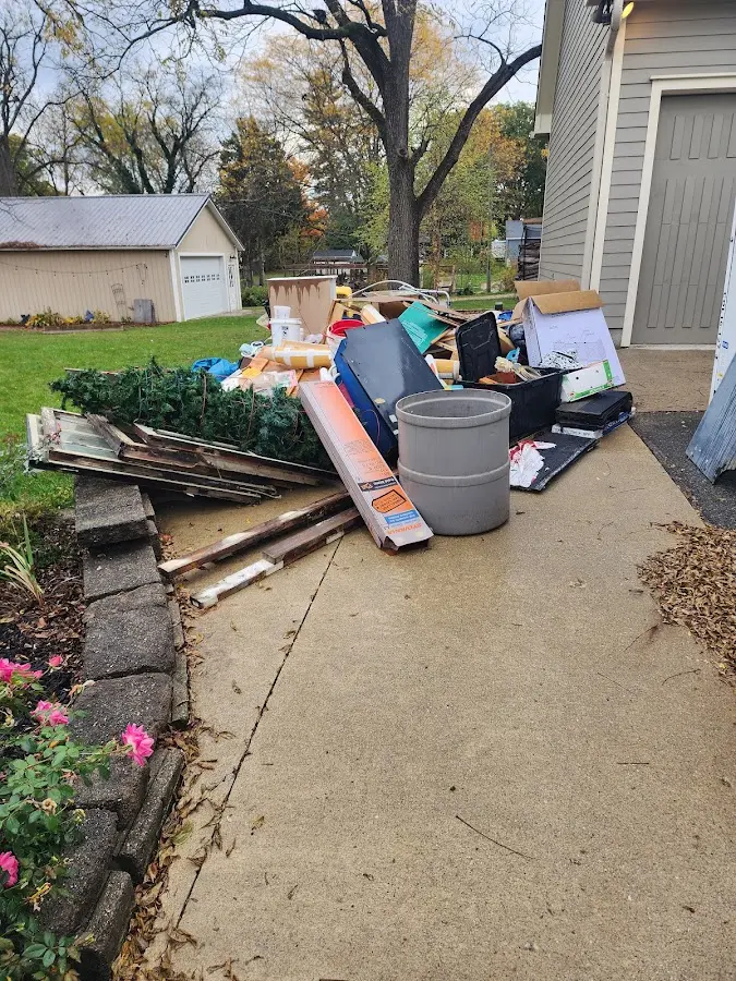 Dumpster being loaded with debris for Demolition Dumpster Rental in South Huntingdon